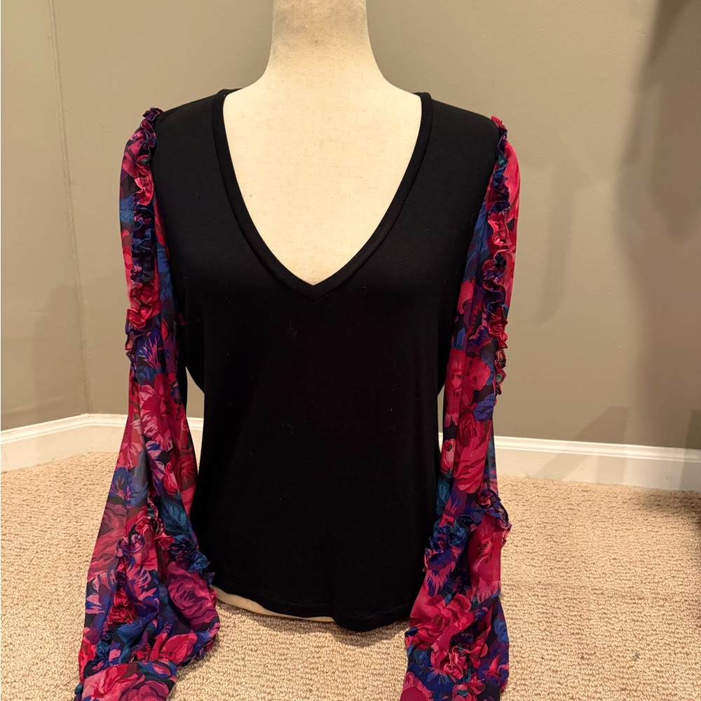 V neck blouse with rose pattern sleeve with ruffle detail